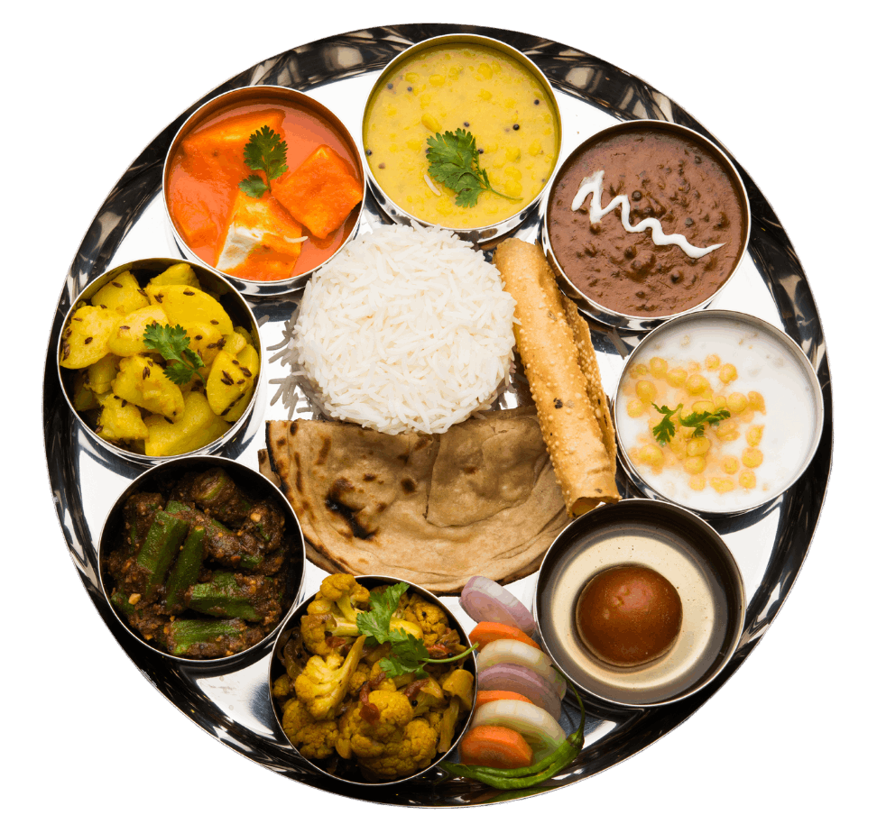 A colourful Indian thali with rice, breads, curries and sides